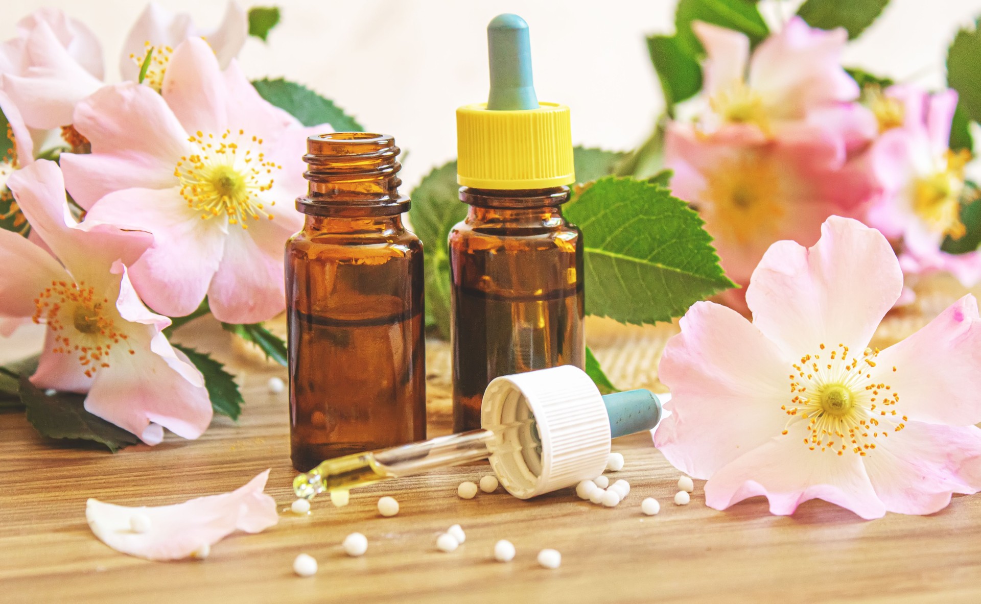 rosehip extract in bottles. Homeopathy. Selective focus.